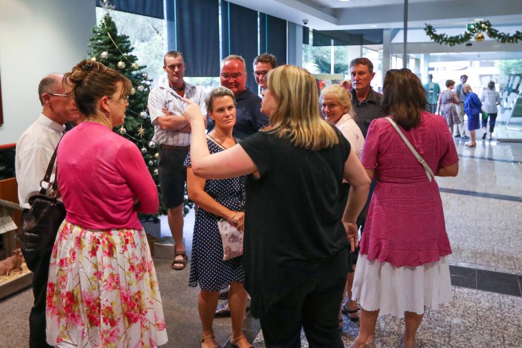 Clash of opinions: Those in favour and those against a protest exclusion zone trade words in the Albury council foyer after Monday night's debate over introducing a safe area around the city's abortion clinic. Picture: MARK JESSER