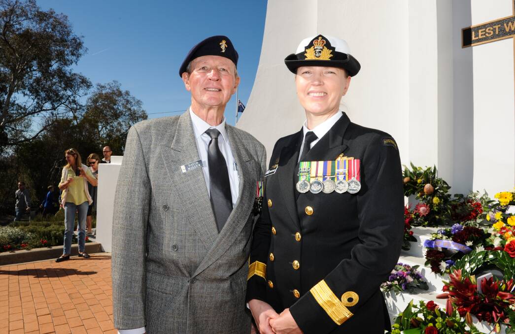 Moment in the sun: Retired Lieutenant-Colonel David Miller with Canberra-based daughter Commodore Michele Miller after her commemorative address at Albury's Anzac Day service. Picture: MARK JESSER