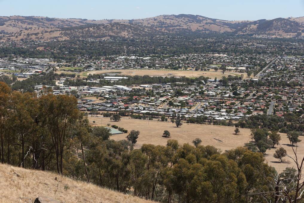 Ringed city: A view of Bears Hill and Federation Hill to the south of Wodonga taken from the Huon Hill lookout.