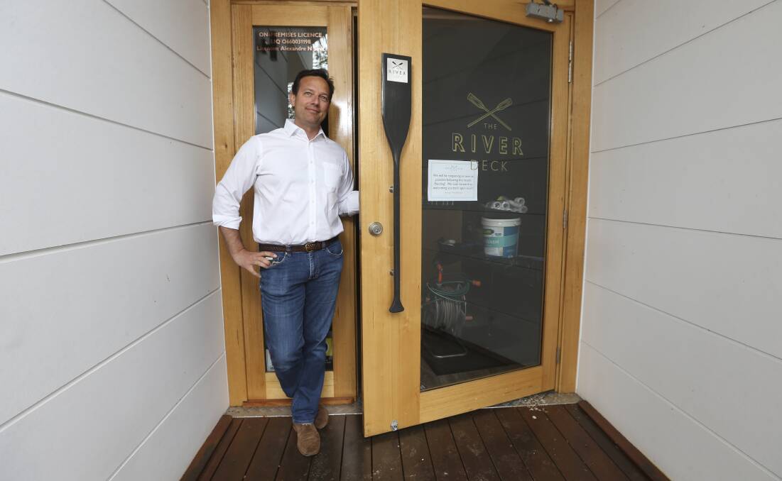 Welcome back: Alex Smit has finally been able to reopen the doors at the River Deck Cafe after waters have receded from the Murray River.