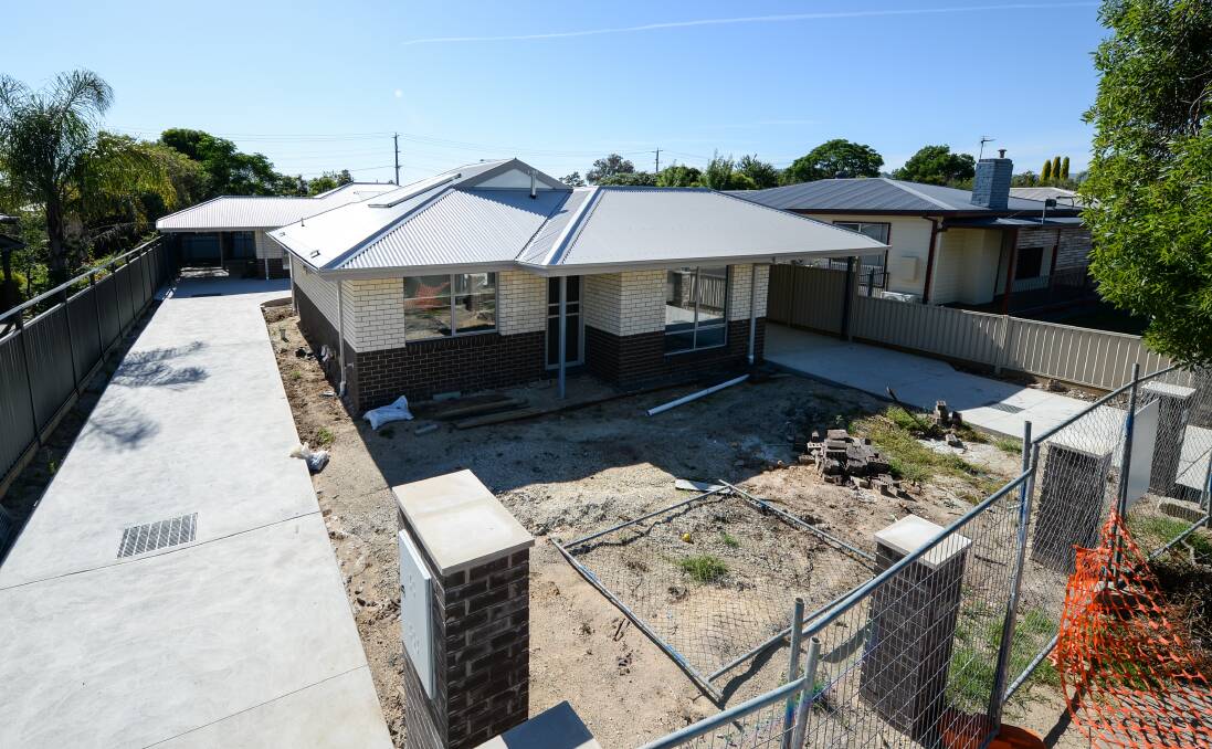 Abandoned: Public housing units in Wodonga's Beardmore Street which have been left unfinished by Lavington firm Magi-Build. Picture: MARK JESSER 