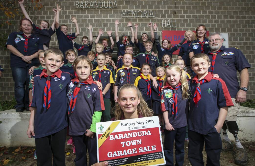 Excited: Baranduda Scout group members including Andrea Bejsta (with sign) are geared up for their garage sale. Picture: JAMES WILTSHIRE