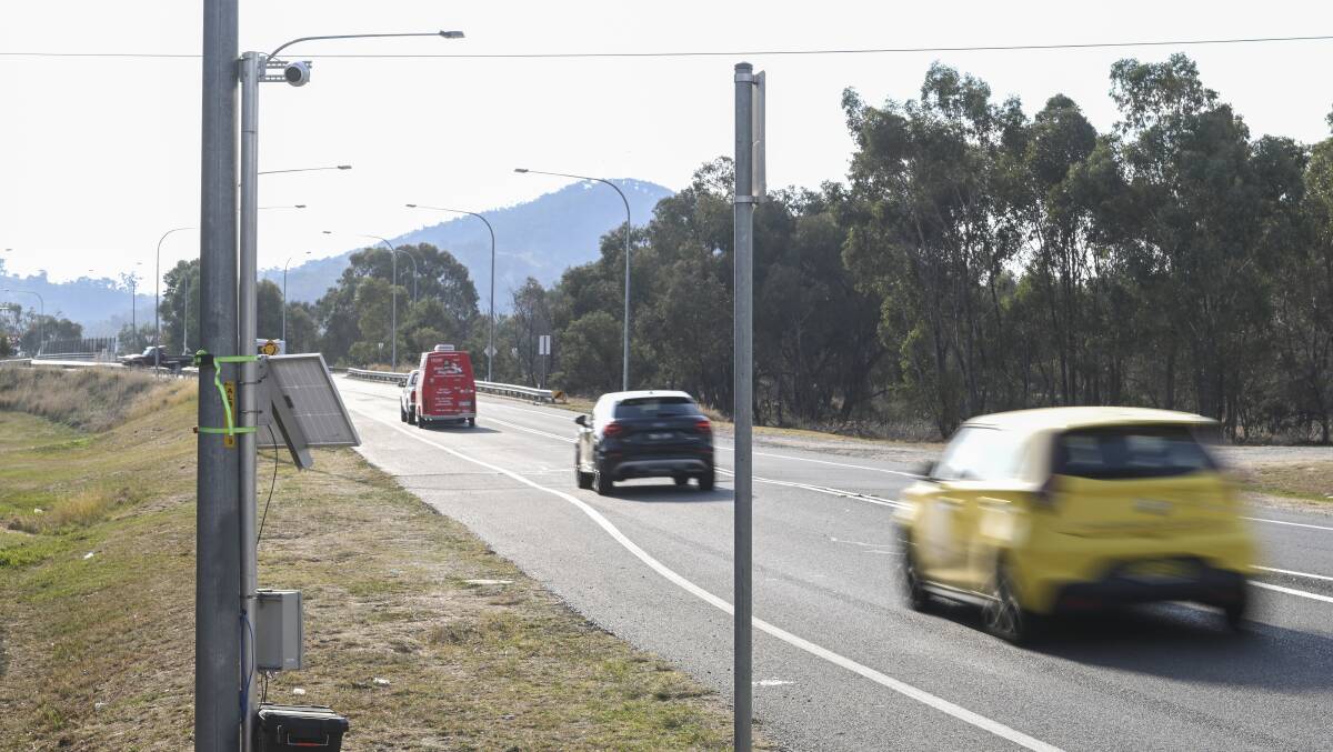 Cars head past a camera towards the Hume Highway along Thurgoona Drive, which many locals want to see have dual lanes in each direction. Picture by Mark Jesser 