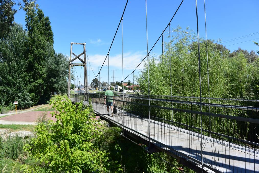 For the chopping block: The Melbourne Road foot and cycle bridge is being demolished with Wodonga Council saying its deck lacks stability and durability.
