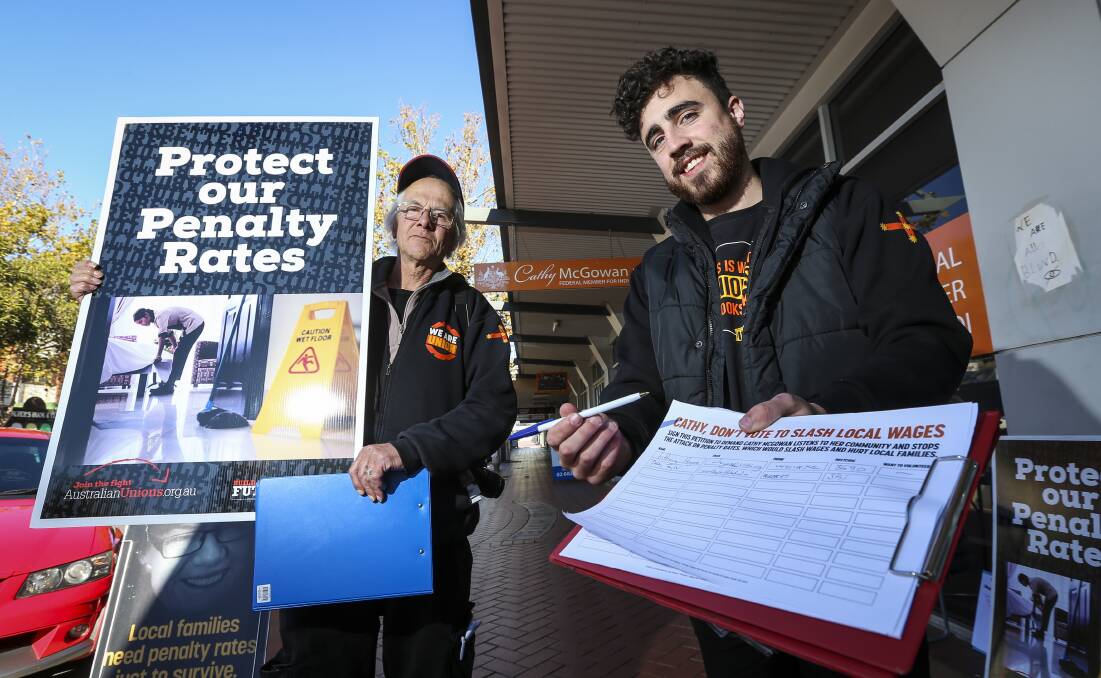 On the attack: North East union chief Chip Eling with Victorian Trades Hall Council helper Anthony Hayes, from Melbourne, at Cathy McGowan's Wodonga office. Picture: JAMES WILTSHIRE 