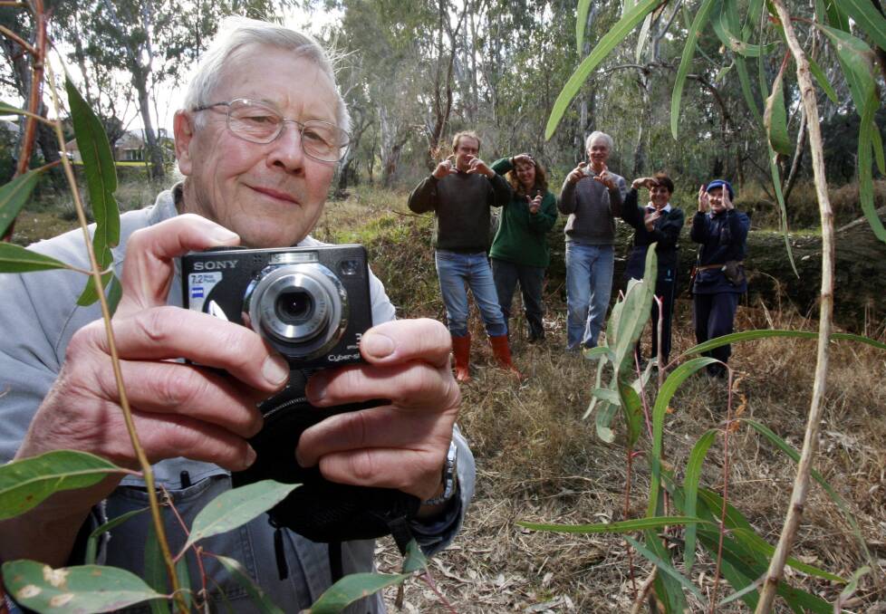 Shutterbug: Peter Curtis with fellow Landcare group members in 2006 after the organisation received a digital camera for photographs of plant species in their district.