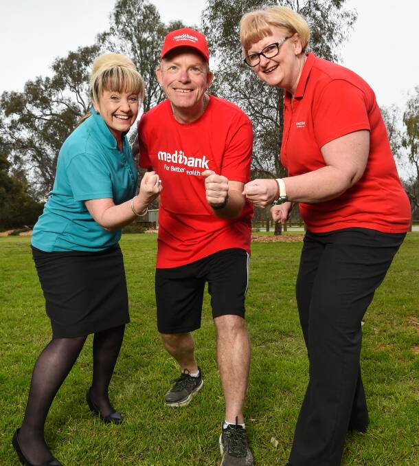 Ready to go: Claudia Rowland, Simon Randall and Yvonne Weaven get set for Saturday's parkrun which is part of a bid for a participation record. Picture: MARK JESSER