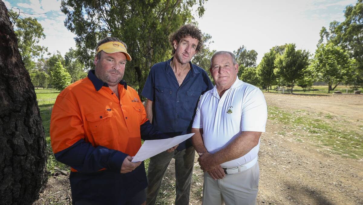 READY TO ROLL: Shaun Whitechurch with consortium members Stephen O'Bryan and John Fraser with plans for their water fun park to be built near Corowa's tennis centre.