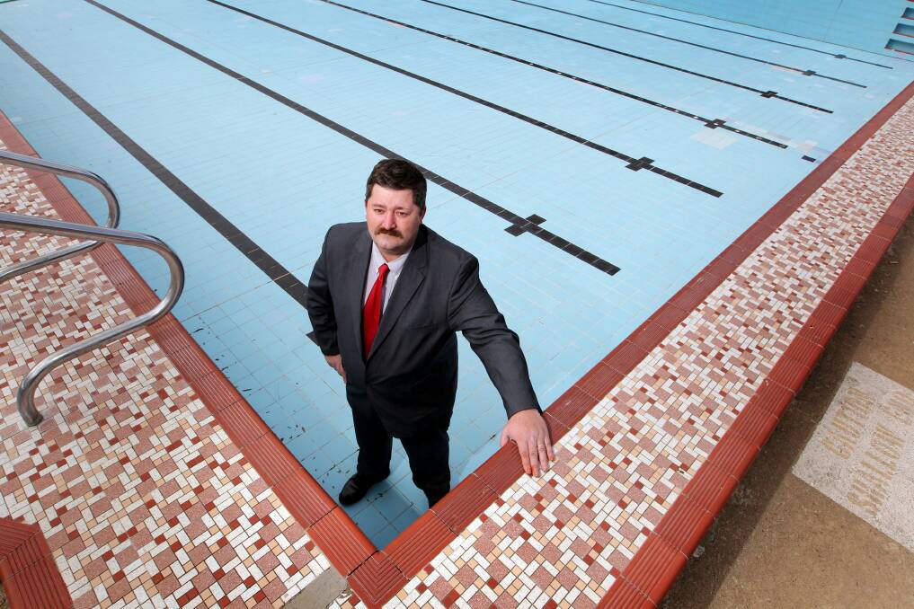 Making ripples: Darren Cameron at Lavington's pool which he wants kept in lieu of investment in an aquatic centre at Lauren Jackson stadium. He lost a move to abandon the East Albury plan at Monday night's council meeting.
