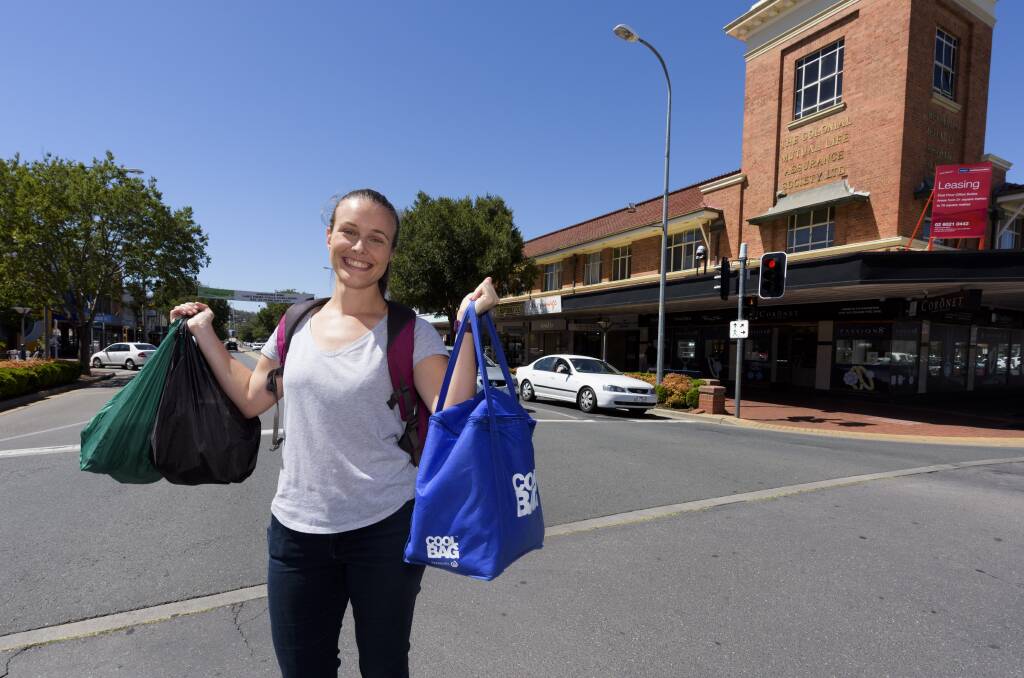 Legging it: Amanda Cohn was forced to carry her shopping home as part of spending the week without a car. Picture: SIMON BAYLISS 
