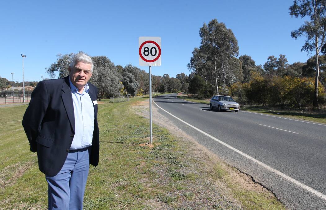 Slow down: Councillor Henk van de Ven at Thurgoona Drive near the Thurgoona golf course. The 80km/h zone in that area should be 60km/h, Albury Council will tell the Roads and Maritime Authority.