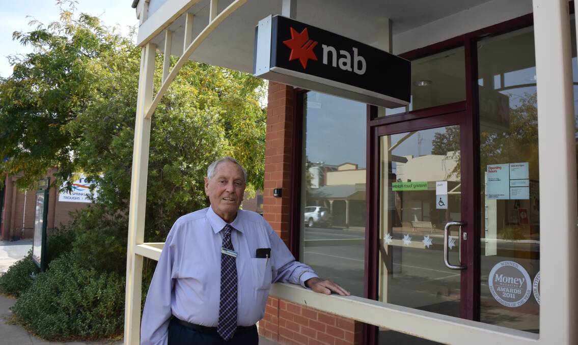 Interest withheld: Berrigan councillor Bernard Curtin outside the NAB branch in Chanter Street, Berrigan, which will be closed by the banking titan in July.  A fall in patronage is being blamed for the shutdown.