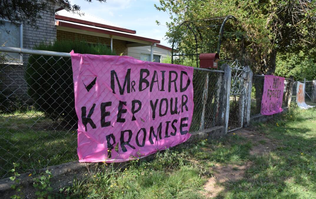 Sign of anger: This Tumbarumba resident has made a written plea to NSW Premier Mike Baird to stop his hometown being joined with Tumut. 
