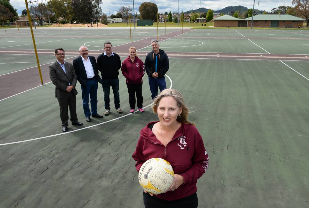 Unsatisfactory: Alliance for Change council candidates Chris Rogers, Ron Mildren, David Johnston and Trevor White with the netball association's Holly McFarlane and Katrina Donelan at the Kelly Park courts.