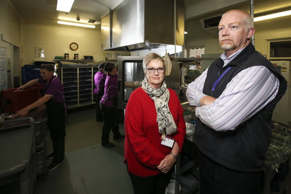 Food for thought: Indigo North Health catering manager Toni Chubb and chief executive Shane Kirk in the cramped confines of the food preparation area. Picture: JAMES WILTSHIRE