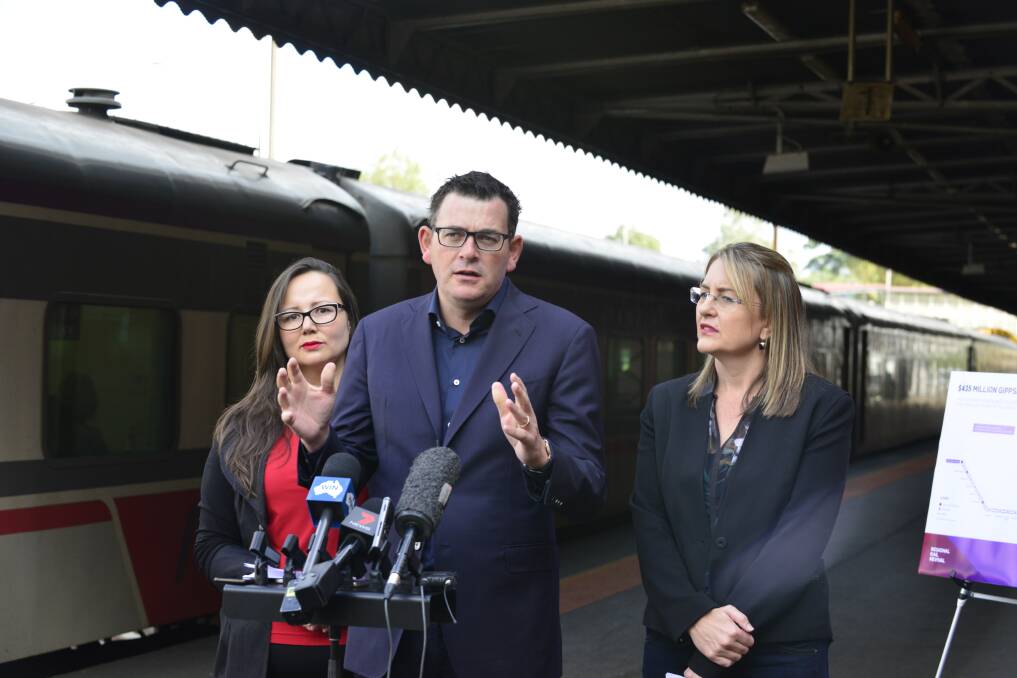 Political platform: Eastern Victoria Upper House MP Harriet Shing, Victorian Premier Daniel Andrews and Transport Minister Jacinta Allan at Warragul railway station on Sunday to announce new spending on the state's train lines. 