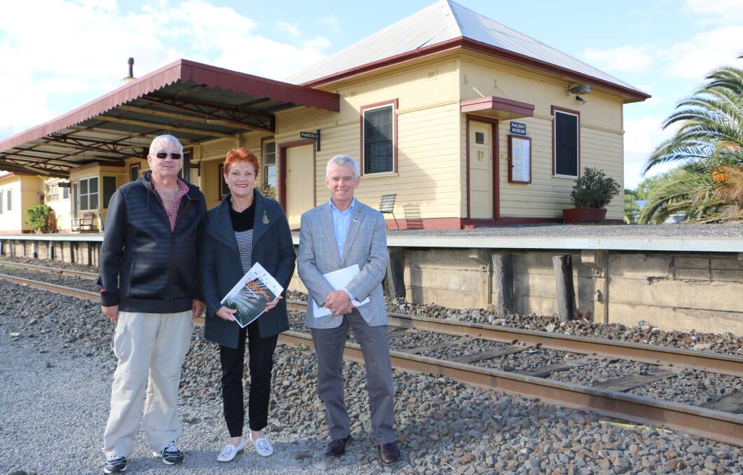 Lined up: One Nation senators Brian Burston, Pauline Hanson, Malcolm Roberts at Tocumwal railway station last week during a tour of the Riverina. They were briefed on the inland rail project and its benefits for the area by Berrigan Shire general manager Rowan Perkins but did not offer public support.