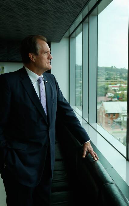Top end of town: Tax commissioner Chris Jordan looks south over Albury from the highest floor of the Smollett Street office. Picture: MARK JESSER