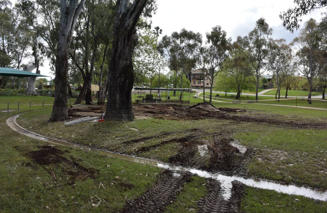 Gone: The empty space created by the removal of playground equipment from Bangerang Park at Corowa after the area was flooded.