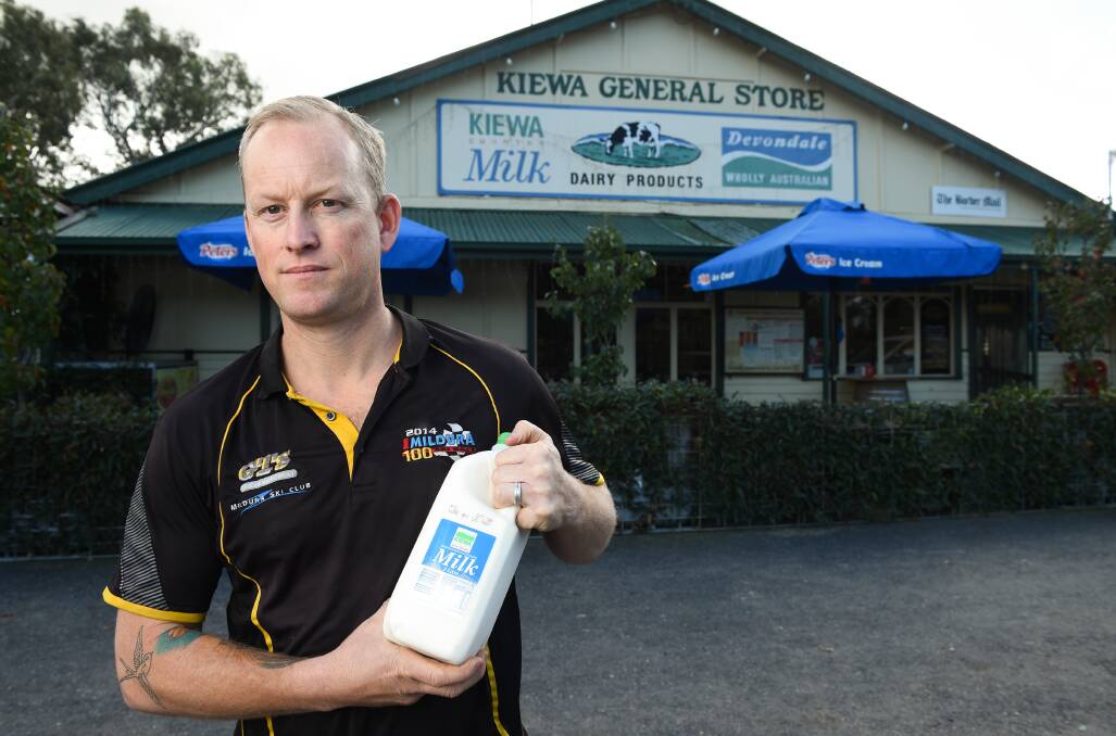 Name shame: Brendon Arundel outside his store. He does not want to see Kiewa Country disappear from the labels of milk sold at his shop.
