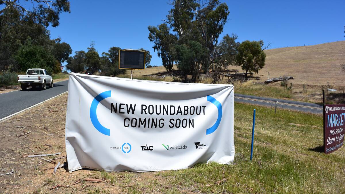 Sign of the times: A banner promoting the construction of a roundabout at the Yackandandah turn-off from the Beechworth-Wodonga Road.