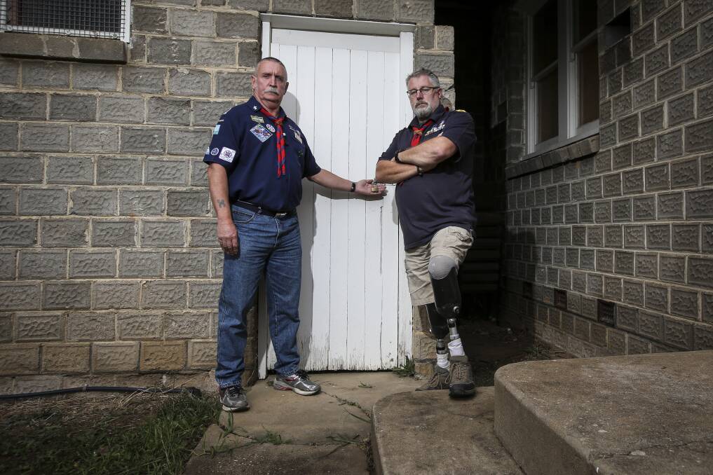 Blocked: Scout leaders Brendan Greaves and Dennis Ramsay with the male toilets at their Baranduda hall which are shut for safety concerns and inaccessible anyway for those with wheelchairs. Picture: JAMES WILTSHIRE