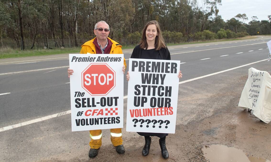 Not impressed: Bright CFA fire captain Paul Mansfield and member for Euroa Steph Ryan indicate their dissatisfaction with the CFA changes being pushed by the Victorian government.