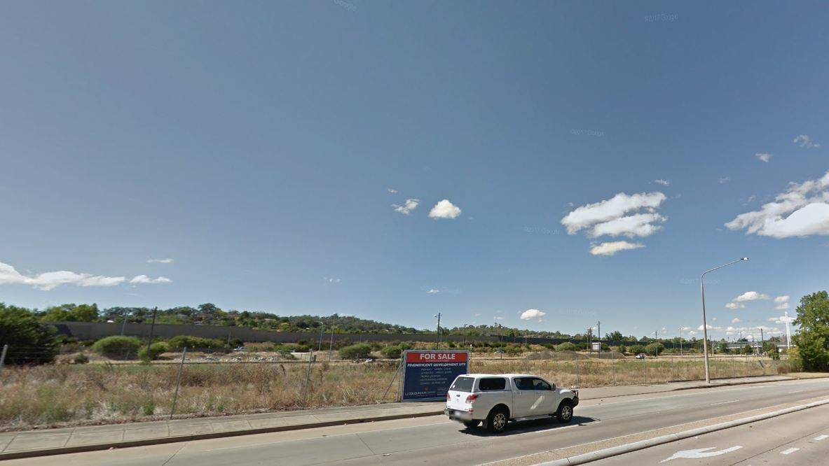 Empty space: A Google street view image of the land once occupied by the flour mill. Railway-owned property lies in the background.