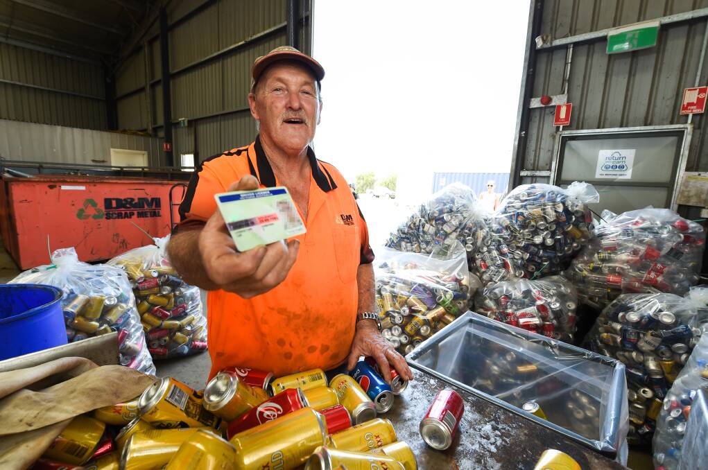 State of origin: D & M Scrap Metal's Jeff Nixon checks driver's cards to stop Victorian licencees dropping off containers at the Corowa business. 