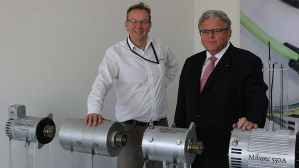 Good deal: Milspec general manager Neil Morrison and Rheinmetall vice president of procurement Reiner Ley with alternators made at the North Albury factory.