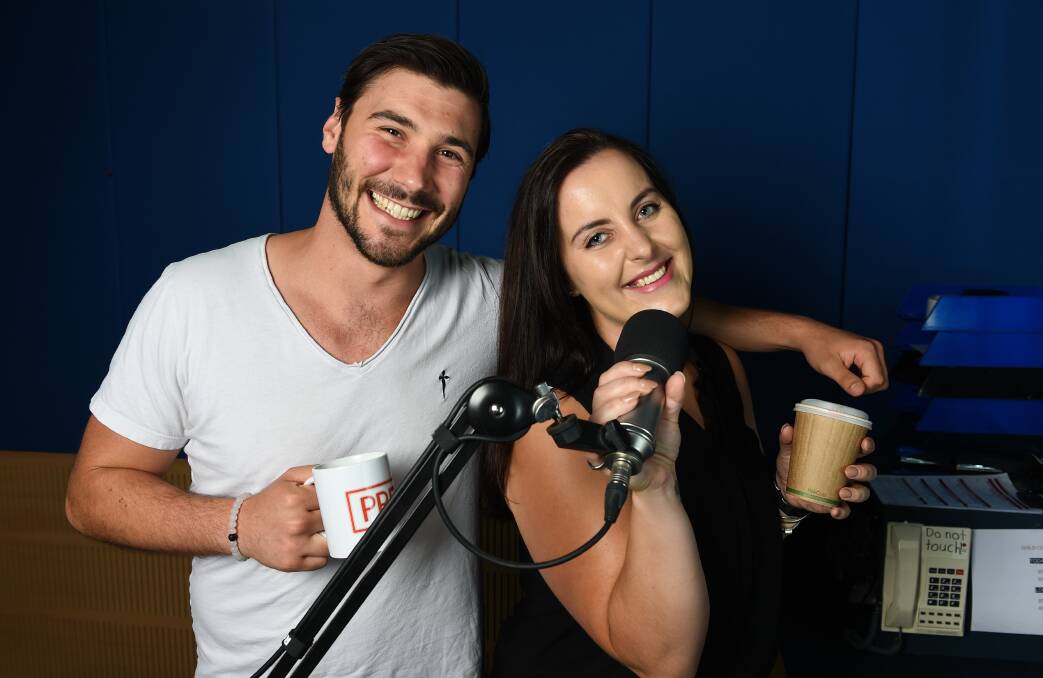 All smiles: Hit FM breakfast duo Seamus Evans and Riley-Rose Harper have narrowly topped the Border's breakfast ratings.