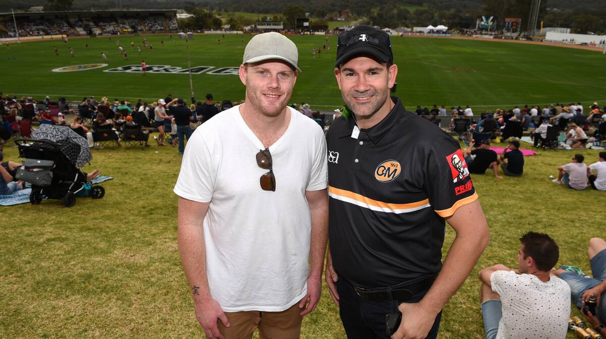 Special guest: Brownlow medallist Adam Cooney enjoying the big day with Ovens and Murray league general manager Sean Barrett.