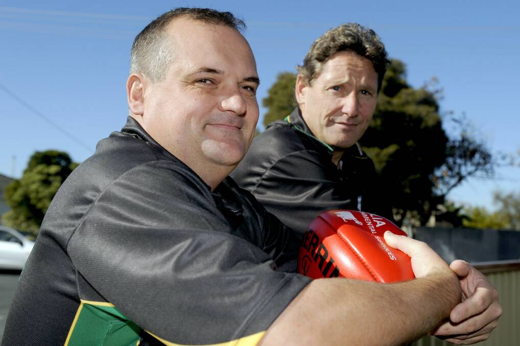 Vehicle changeover: Murray Football League boss Dale Norman and interleague coach Tony Tranter. A motoring sponsorship deal has the competition at odds with the AFL. Picture: SHEPPARTON NEWS 