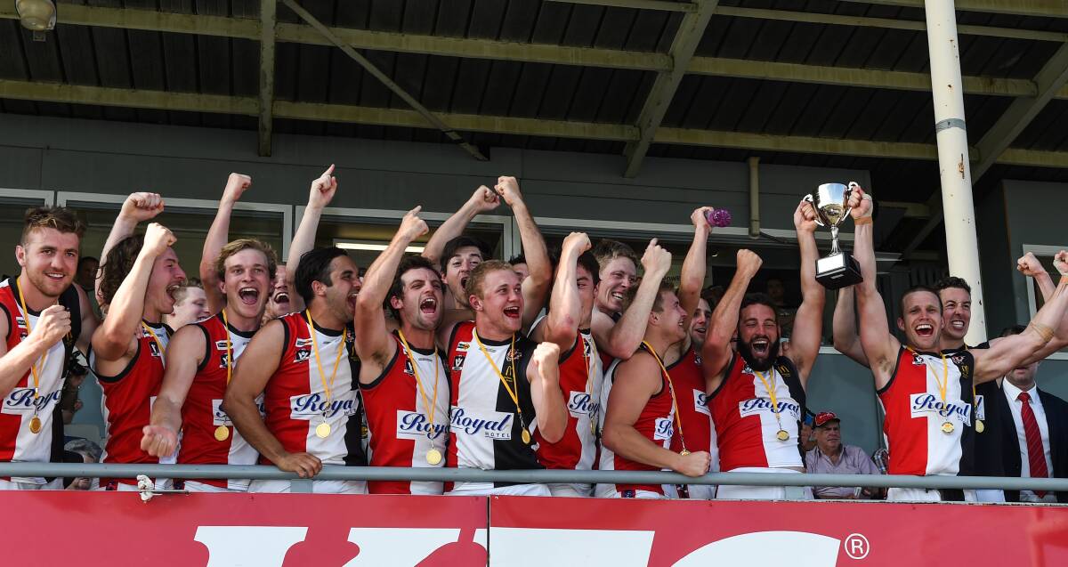 WINNERS ARE GRINNERS: Benalla's long wait for a premiership is over after Sunday's dominant grand final win over Kyabram in Shepparton. Picture: MARK JESSER