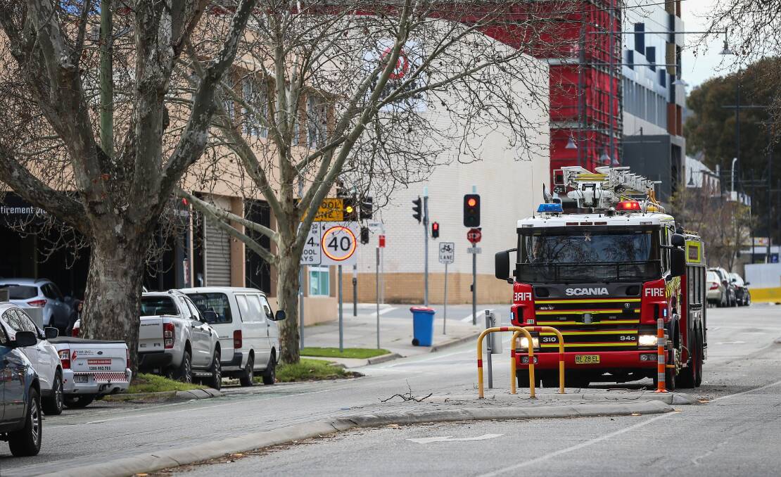 Firefighters attend a fire alarm at the West End Plaza shopping centre, Albury. Photo: James Wiltshire