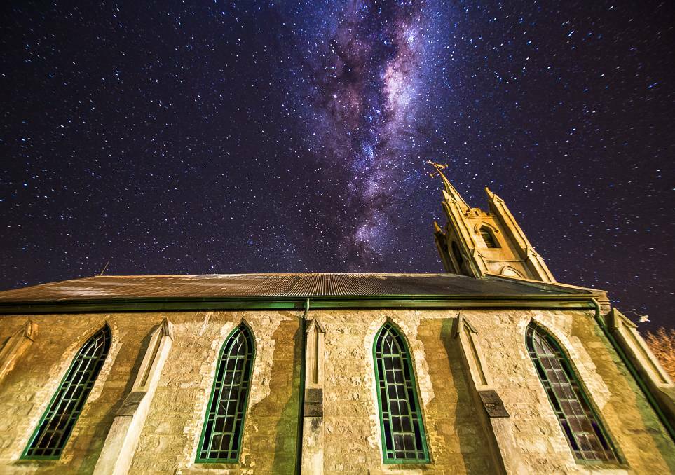 SKY: The galactic core rises above the spire of St Stephens, Beechworth, on a clear, crisp, winter's night. Photo: Matthew McKenzie from our Winter Photo Competition.