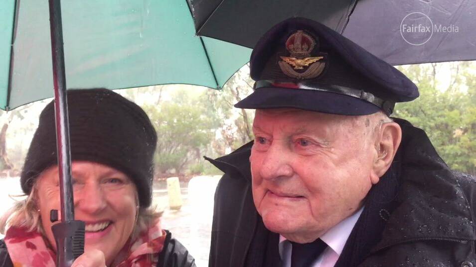 Still soaring: Former bomber command squadron leader Edgar Pickles, 96, watches the Albury Anzac Day service with his original Royal Air Force cap bought from a London tailor more than 70 years ago. Pictures: MARK JESSER