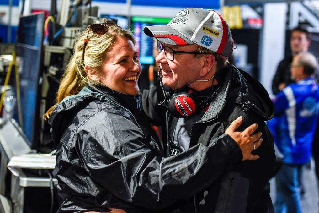HAPPY DAYS: Brad Jones celebrates with Tim Slade's mother after her son's superb third placing in the Gold Coast 600. It was Slade's first podium of the year.