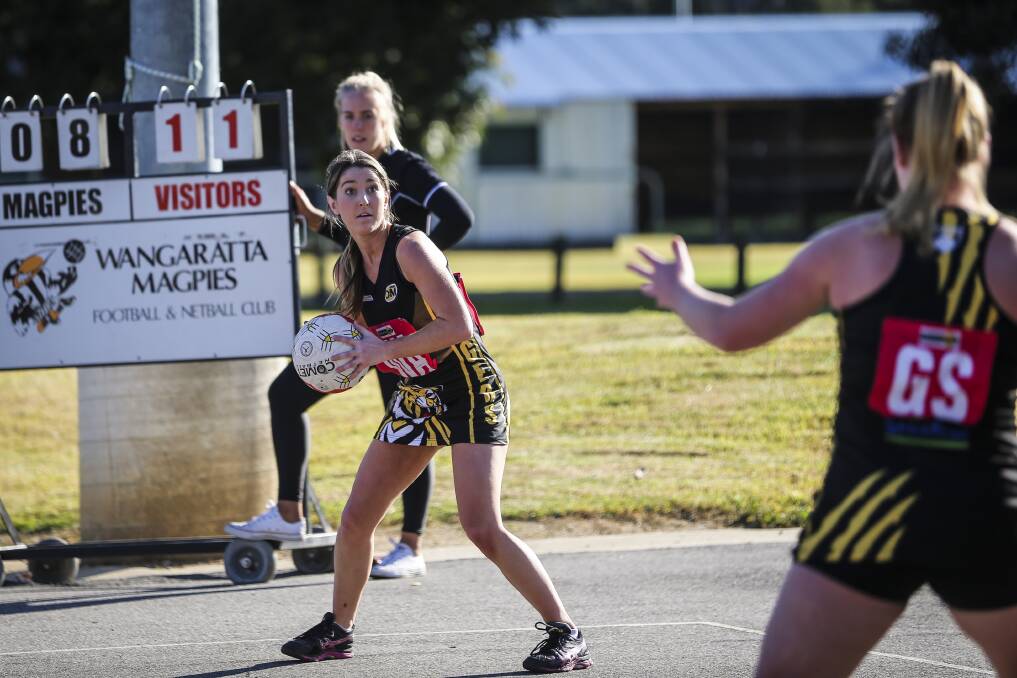 THE ZONE: Albury's Brooke Bice is all concentration as the Tigers hold a three-goal lead early in the match against Wangaratta.
