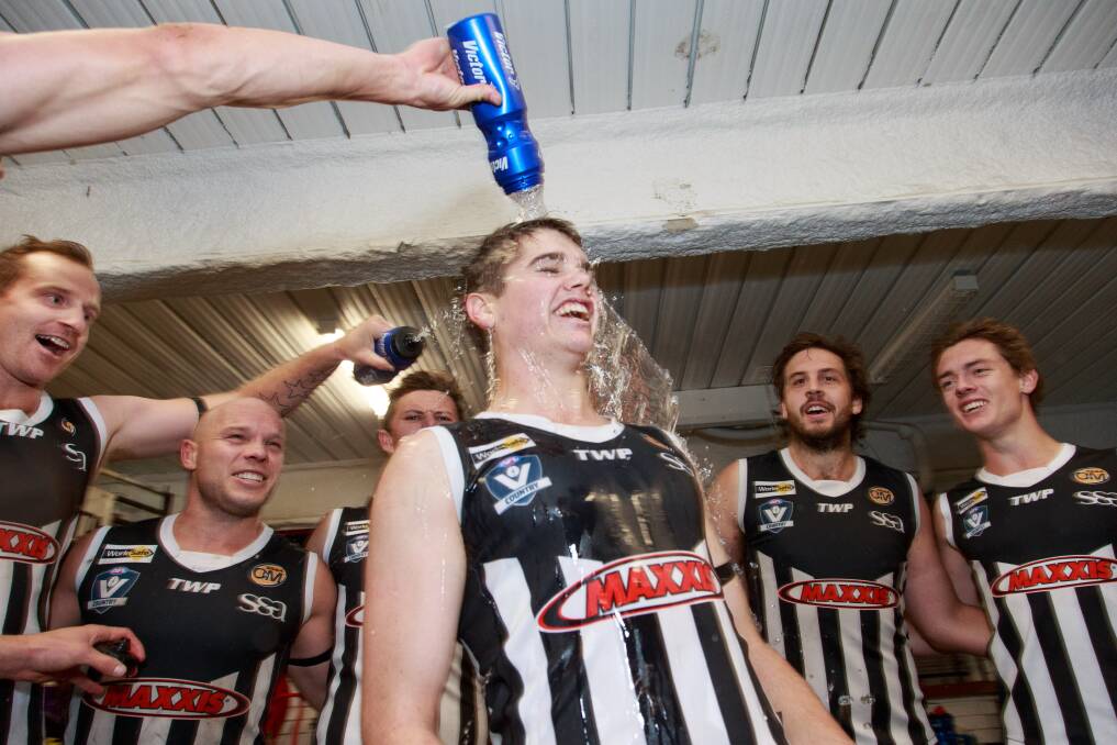 SWEET VICTORY: Liam Byrne celebrates his first senior win after the Pies belted Wodonga by 44 points. Picture: SIMON BAYLISS