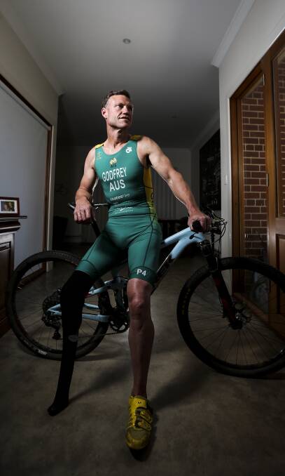 WORLD CHAMPION: Justin Godfrey claimed his maiden cross triathlon world title in the Snowy Mountains. Picture: JAMES WILTSHIRE