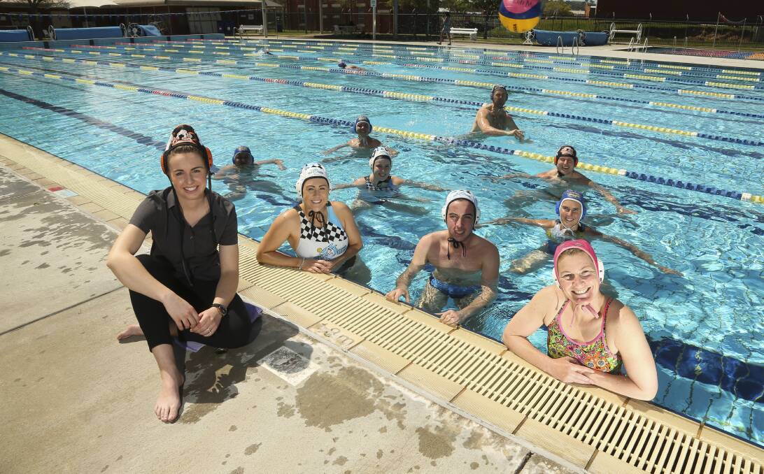 READY FOR BUSINESS: Pirates, Sharks, Albury and Northside players hit the pool ahead of their Ovens and Murray season opener on Sunday. Picture: ELENOR TEDENBORG