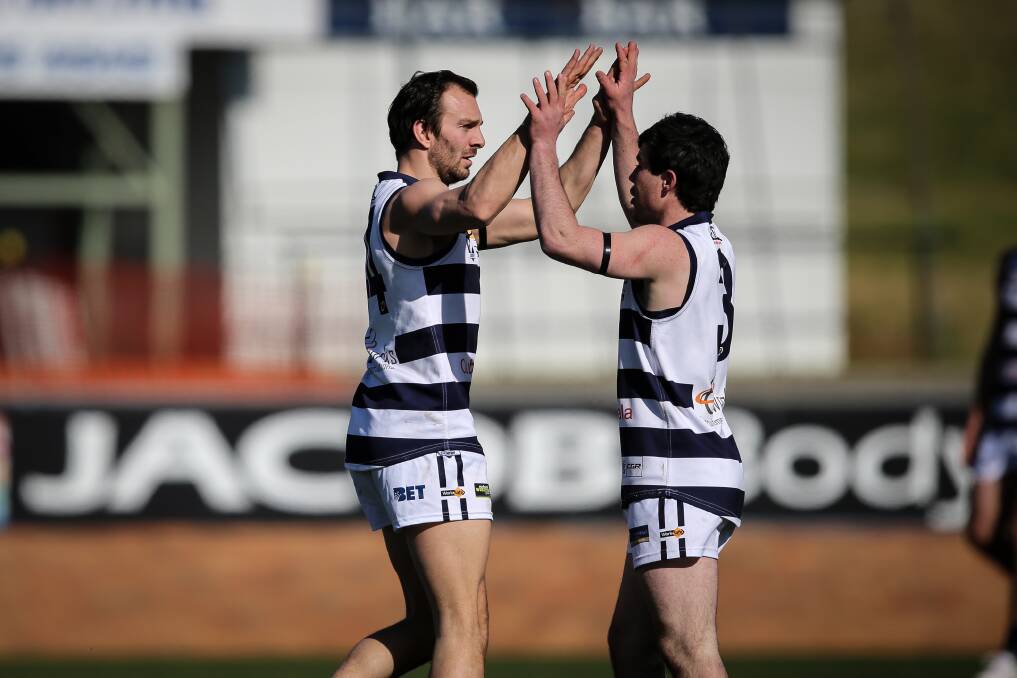 NICK'S KNACK: Yarrawonga's Nick Lawless (left) produced a season-high five
goals in the Pigeons' 58-point win over Lavington. Picture: JAMES WILTSHIRE