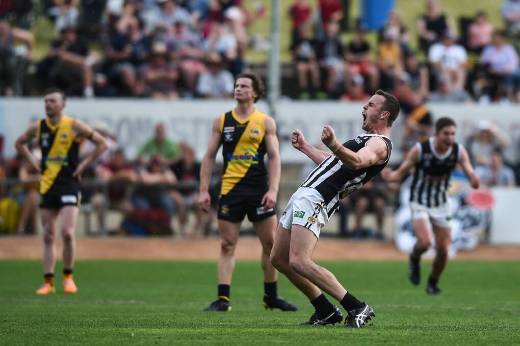 Wangaratta's Tom Whittlesea celebrates a goal in last year's grand final win over Albury at the Lavington Sportsground. The two clubs will now battle to host this year's decider with Lavington ruled out due to ongoing developments.