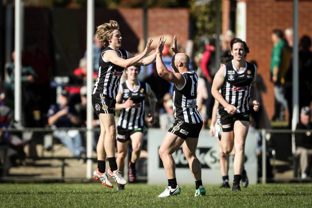 JUMPING JOE: The Pies' Joe Richards celebrates after landing a critical goal against Yarrawonga. Picture: JAMES WILTSHIRE