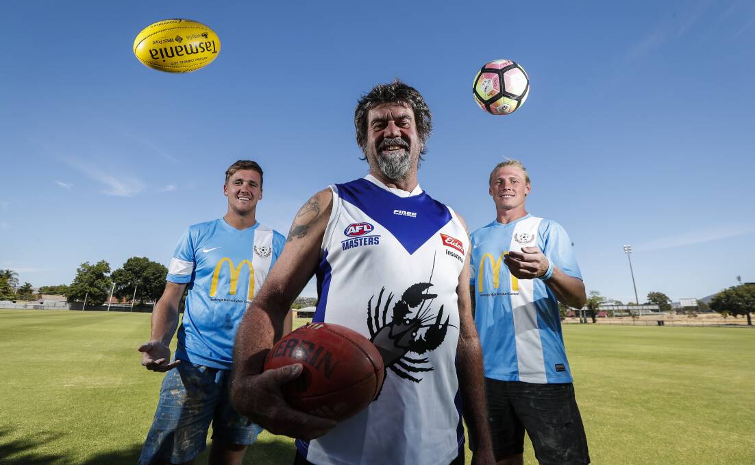 SPORTING CHEER: Soccer's Twin City Wanderers and football's Murray Cray's will play Gaelic football. Josh Zito and Matt Hasler flank Danny Steel. Picture: JAMES WILTSHIRE