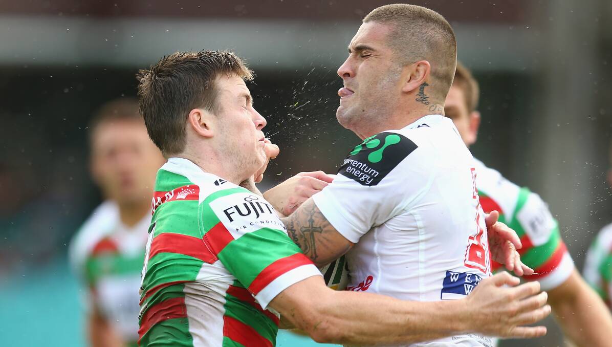 TOUGH STUFF: Dragons' forward Joel Thompson and South Sydney's Luke Keary collide during a match. Thompson visited Albury on Wednesday.