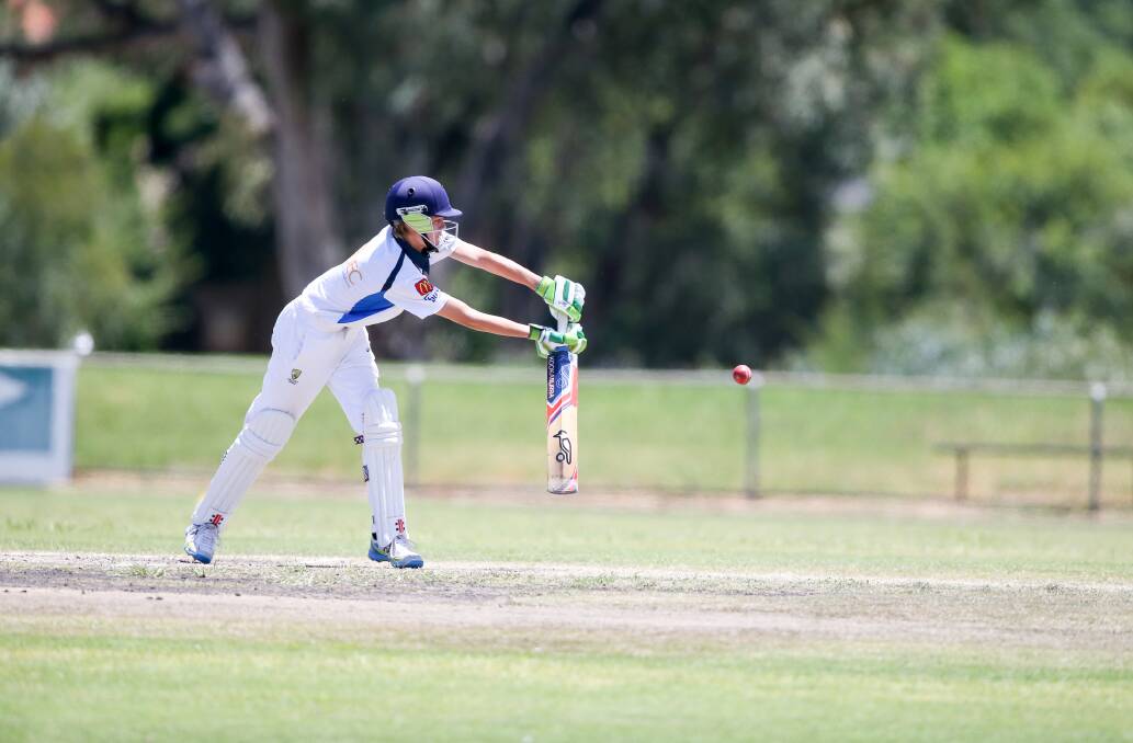 REACH OUT: Albury's Kyle Cooper stretches for the ball in the game against North Albury. Cooper made 25 runs. North will resume on 1-19, losing star bat Ash Borella.