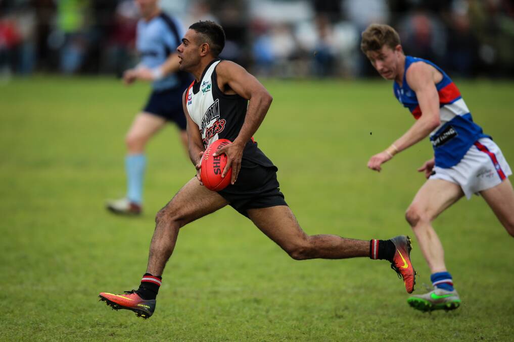 SPEED MACHINE: John-Roy Williams shows his pace during last year's Hume League grand final. The speedster is being touted as a crucial figure in Lavington's revamped attack. 