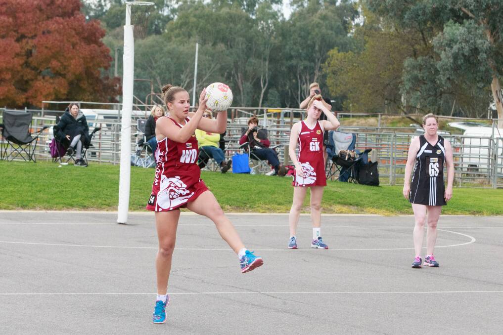 IN STEP: Wodonga's Claudia McKimmie is marching to her own beat against Wangaratta. McKimmie posted nine goals in the visitors' 64-28 loss. Picture: SIMON BAYLISS